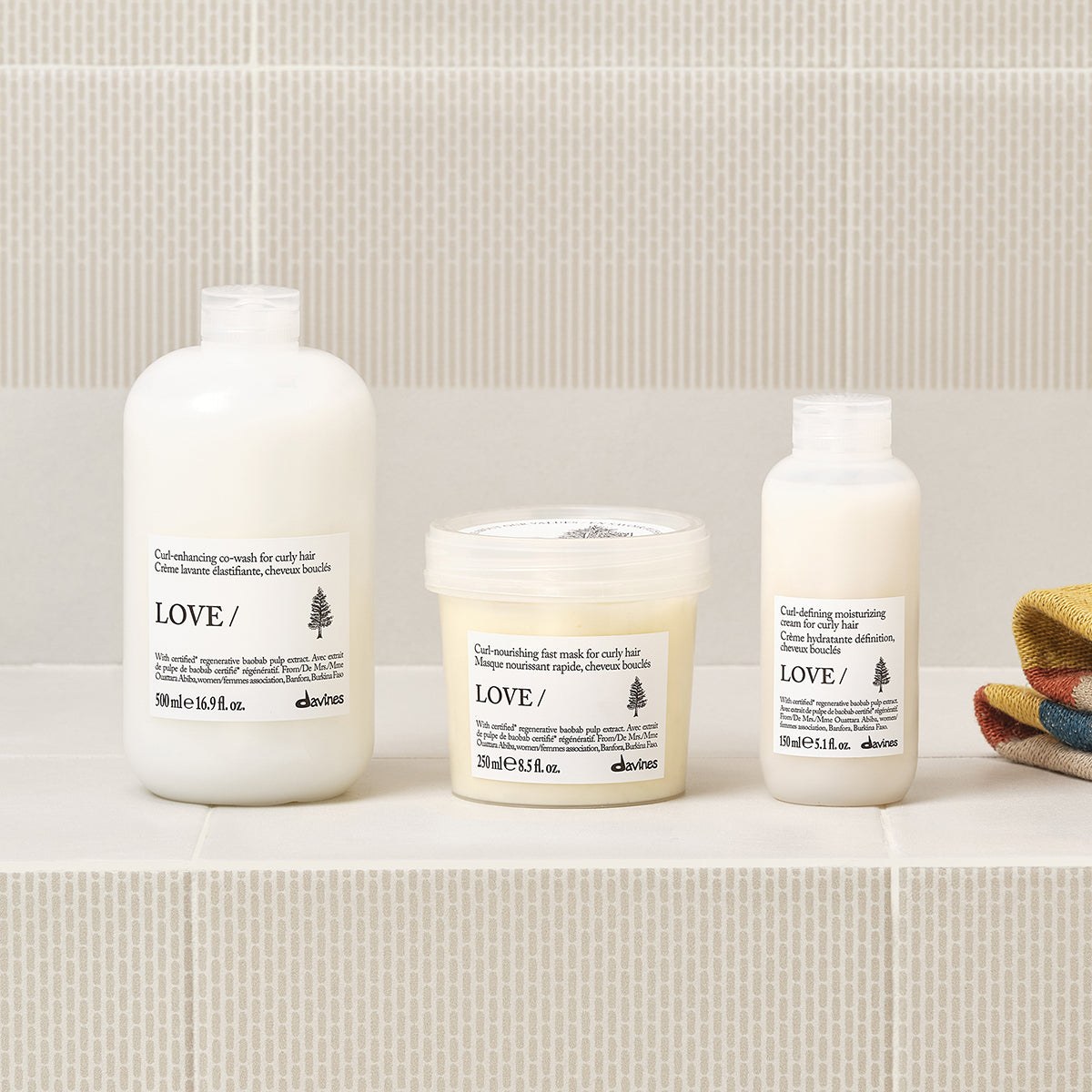 Davines LOVE Curl Hair Mask with the LOVE Curl range on a bathroom shelf